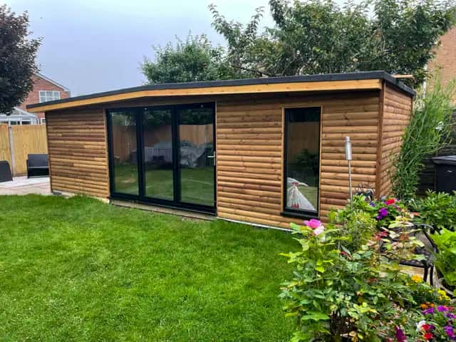 Bespoke garden room and outhouse built by AA Builders ltd in Leicestershire